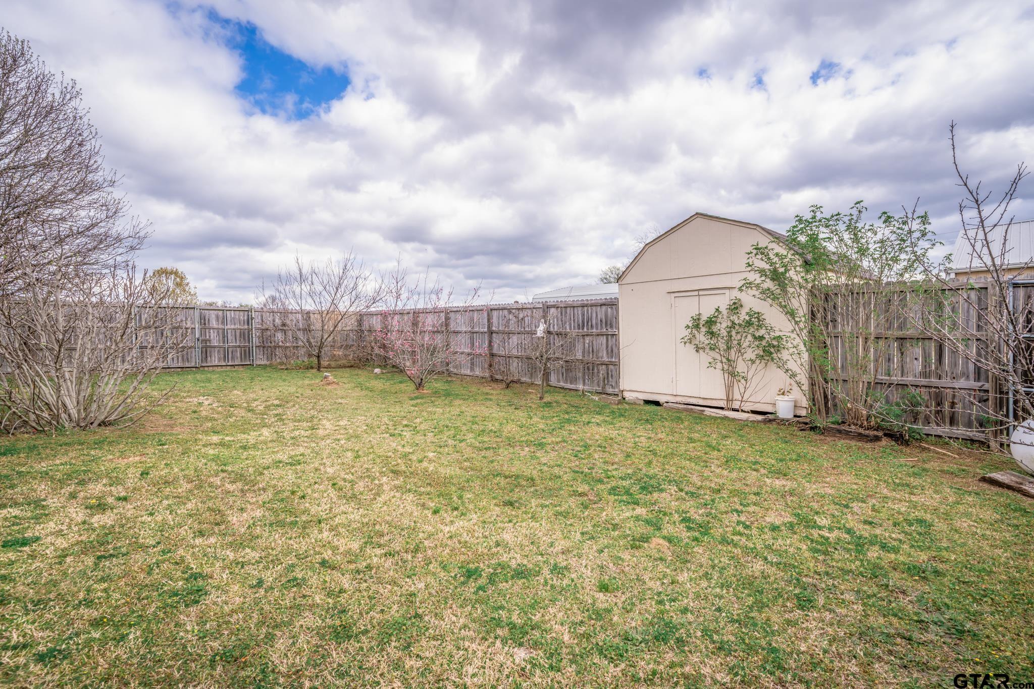 2266 Big Woods Road Longview, TX 75605 - Photo 46 of 48 a view of a backyard