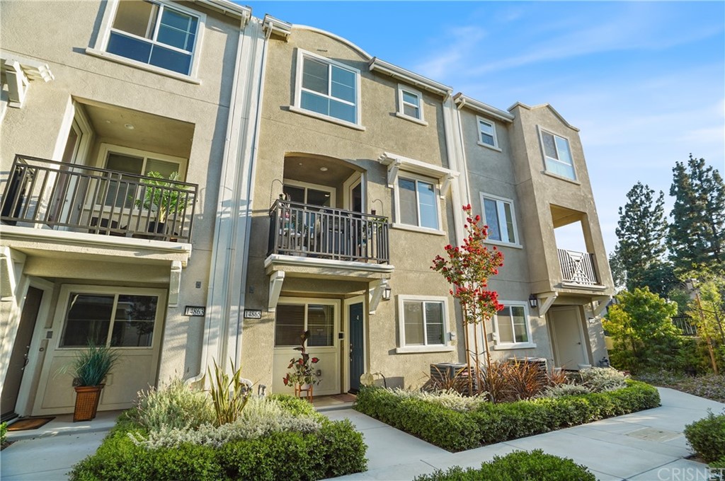 14865 West Maple Terrace Panorama City, CA 91402 - Photo 2 of 36 a front view of a multi story residential apartment building