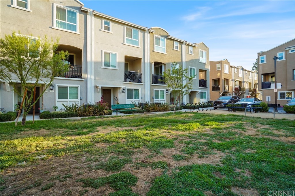 14865 West Maple Terrace Panorama City, CA 91402 - Photo 30 of 36 a view of a building with a yard