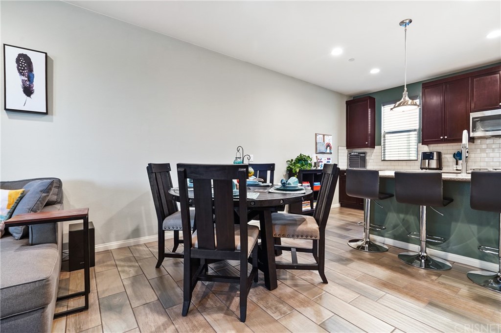 14865 West Maple Terrace Panorama City, CA 91402 - Photo 8 of 36 a view of a dining room with furniture
