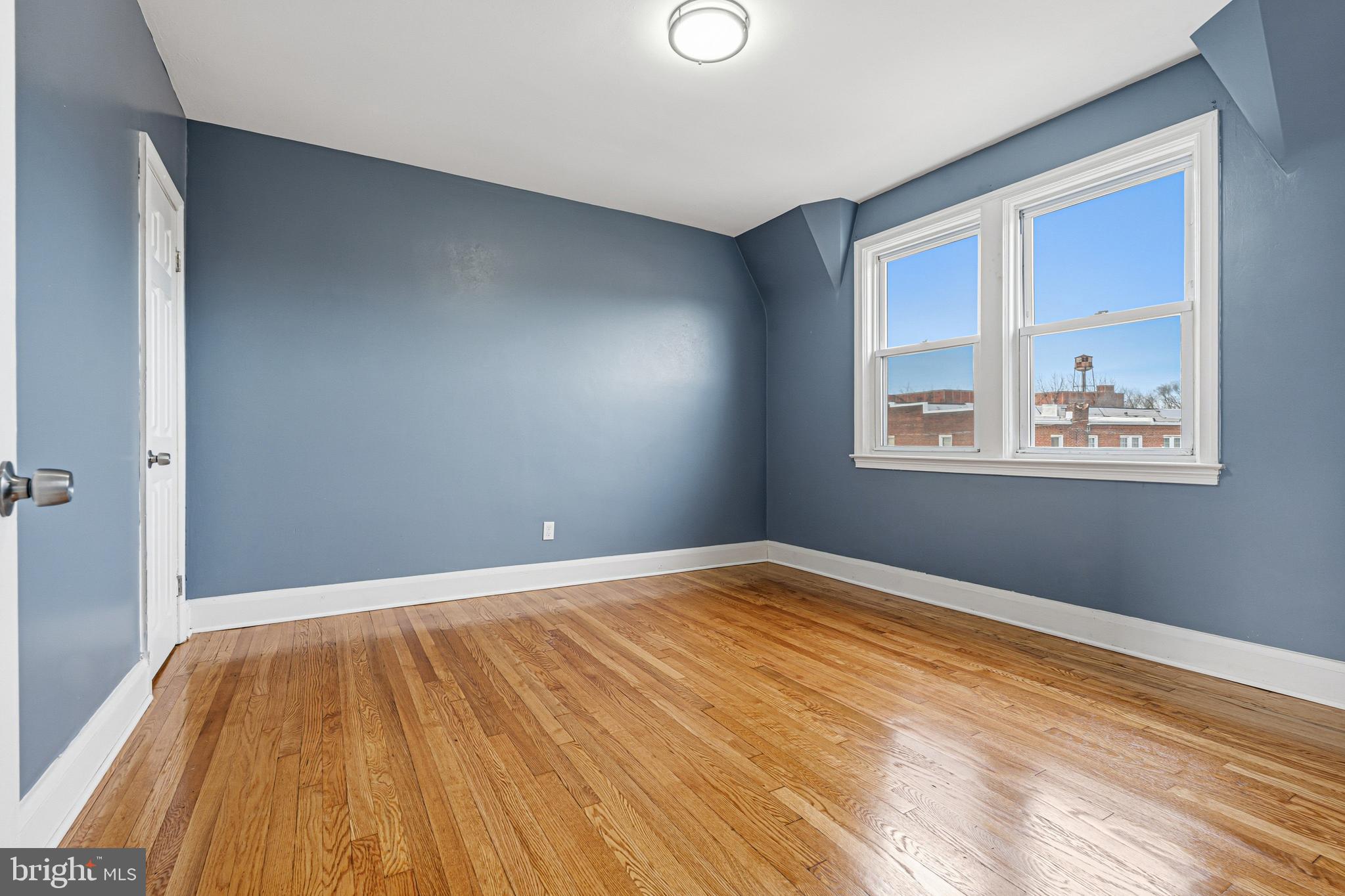 2410 Keyway Dundalk, MD 21222 - Photo 13 of 34 a view of empty room with wooden floor