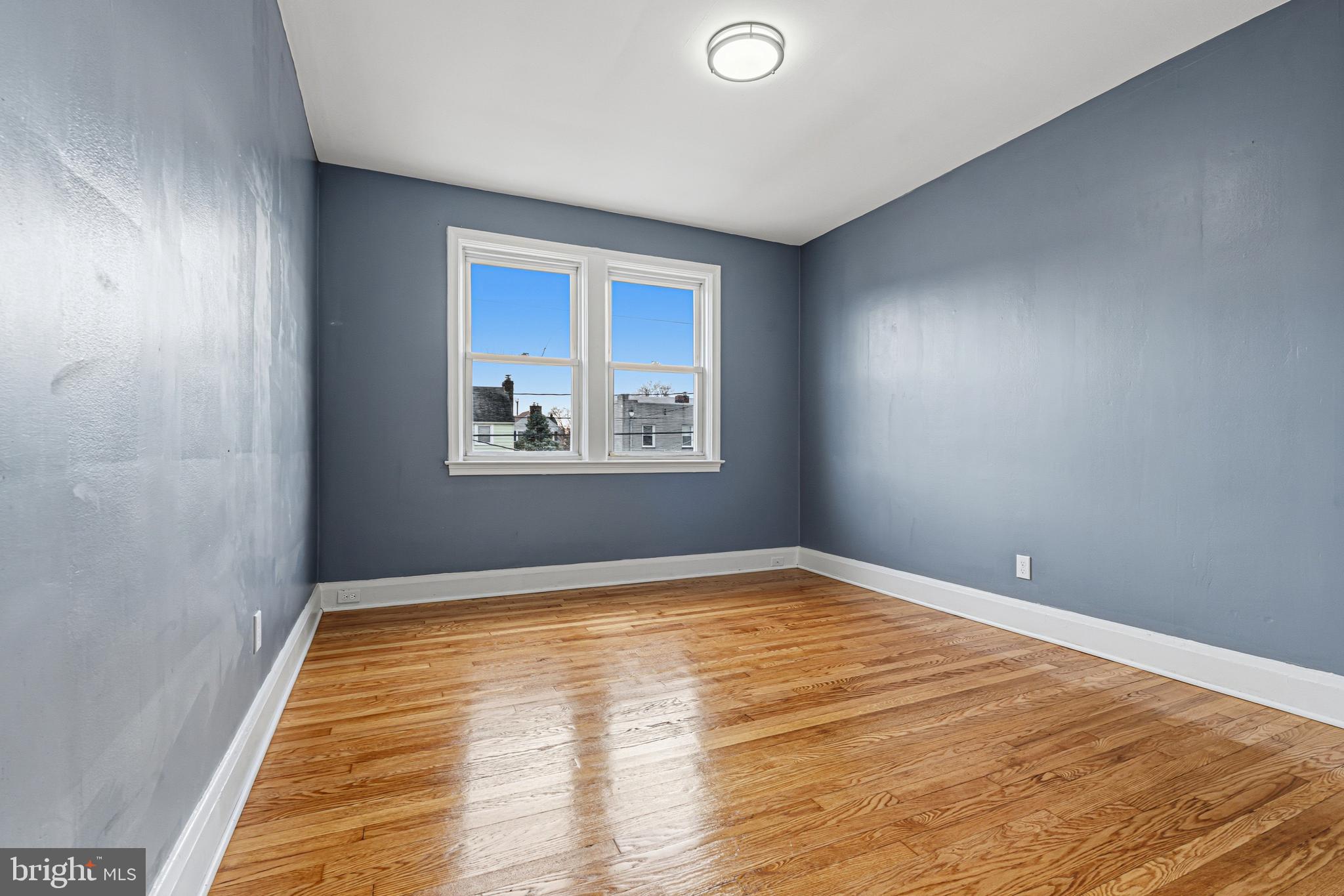 2410 Keyway Dundalk, MD 21222 - Photo 15 of 34 a view of empty room with wooden floor