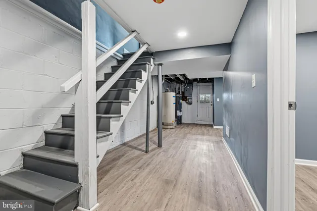 a view of a storage & utility room with a washer dryer