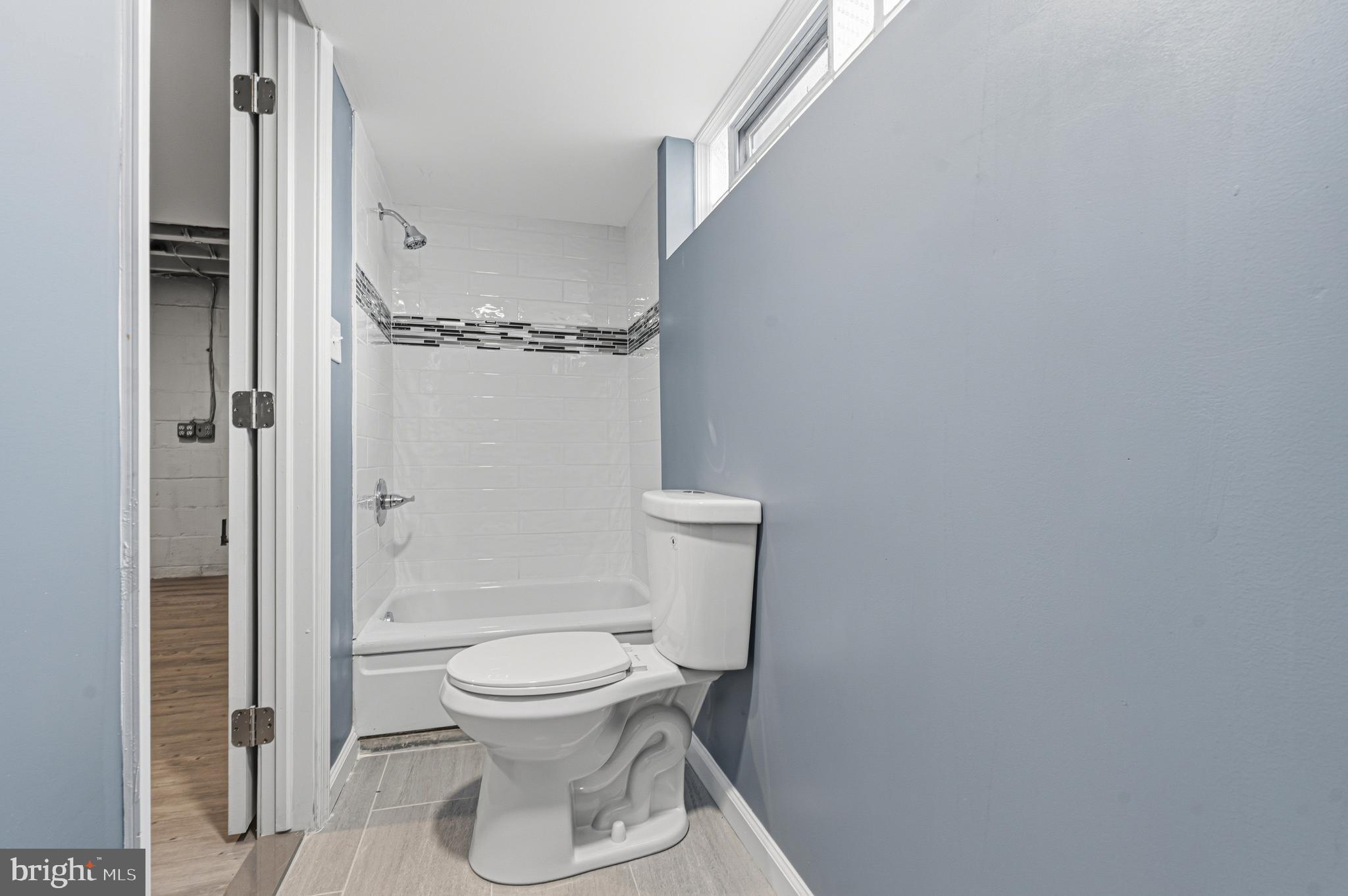 2410 Keyway Dundalk, MD 21222 - Photo 26 of 34 a bathroom with a toilet and a shower