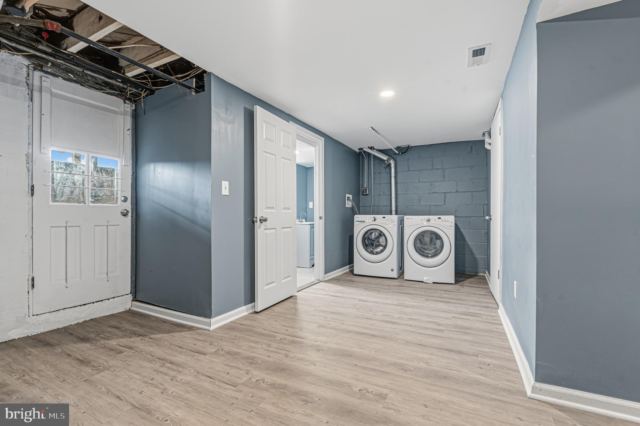2410 Keyway Dundalk, MD 21222 - Photo 29 of 34 a view of a storage & utility room with a washer dryer