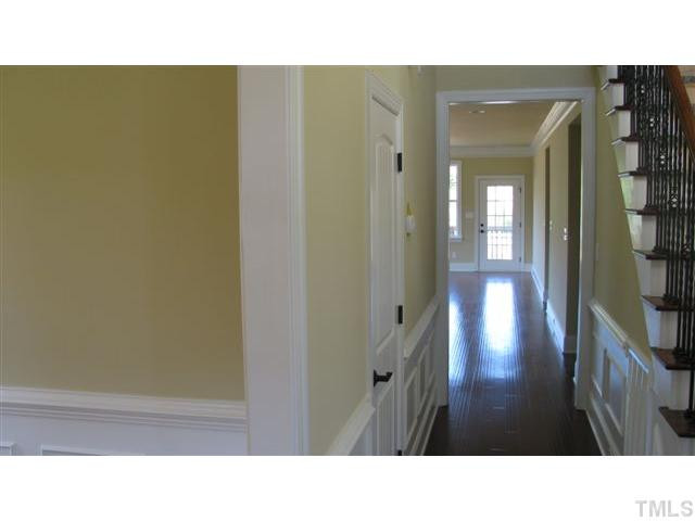 10115 2nd Star Court Raleigh, NC 27613 - Photo 4 of 25 What an Entry Way to welcome your guests! Gleaming bamboo hardwoods, elaborate bead board, elegant wainscotting and picture frame trim work, and an elegantly crafted stairway, Foyer