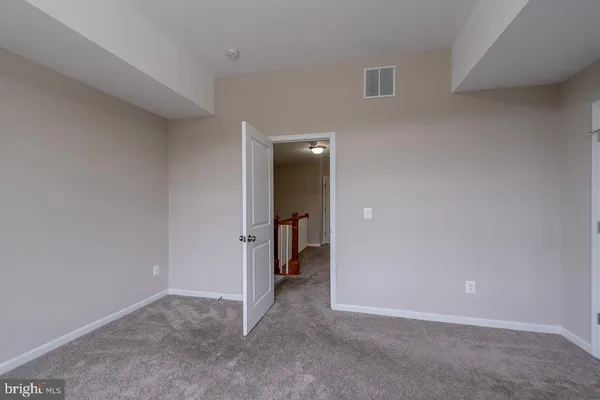 a view of a big room with closet and bathroom