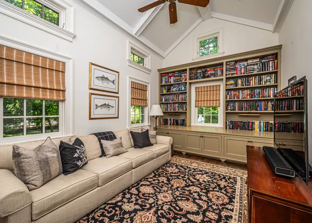 a living room with furniture and a window