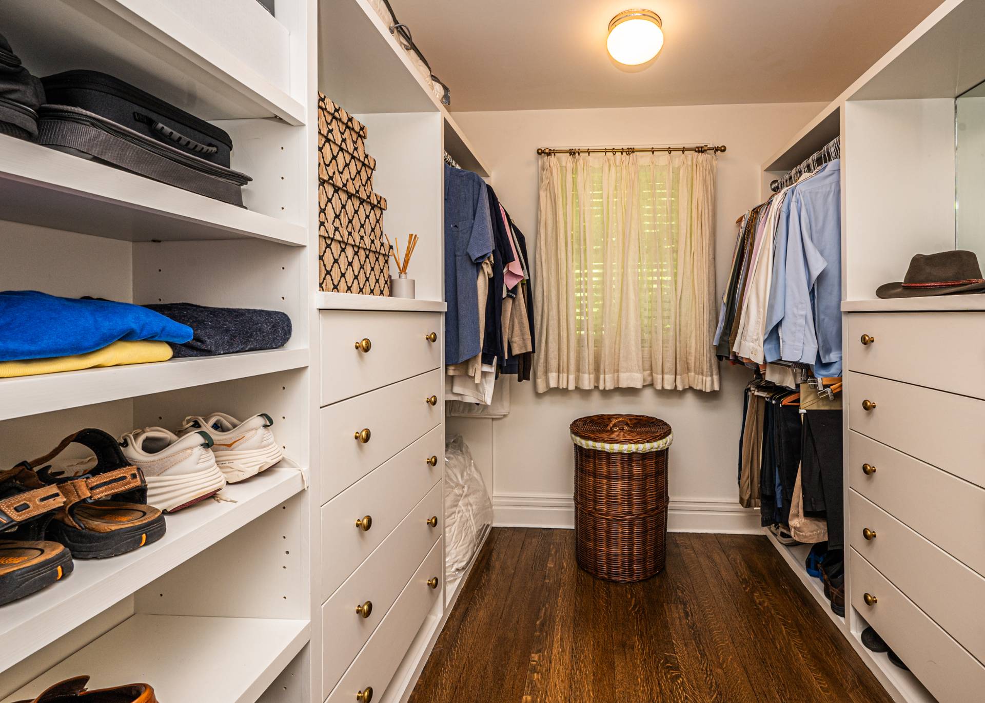 92 South Country Road Remsenburg-Speonk, NY 11960 - Photo 15 of 30 a view of walk in closet with clothes and shoes