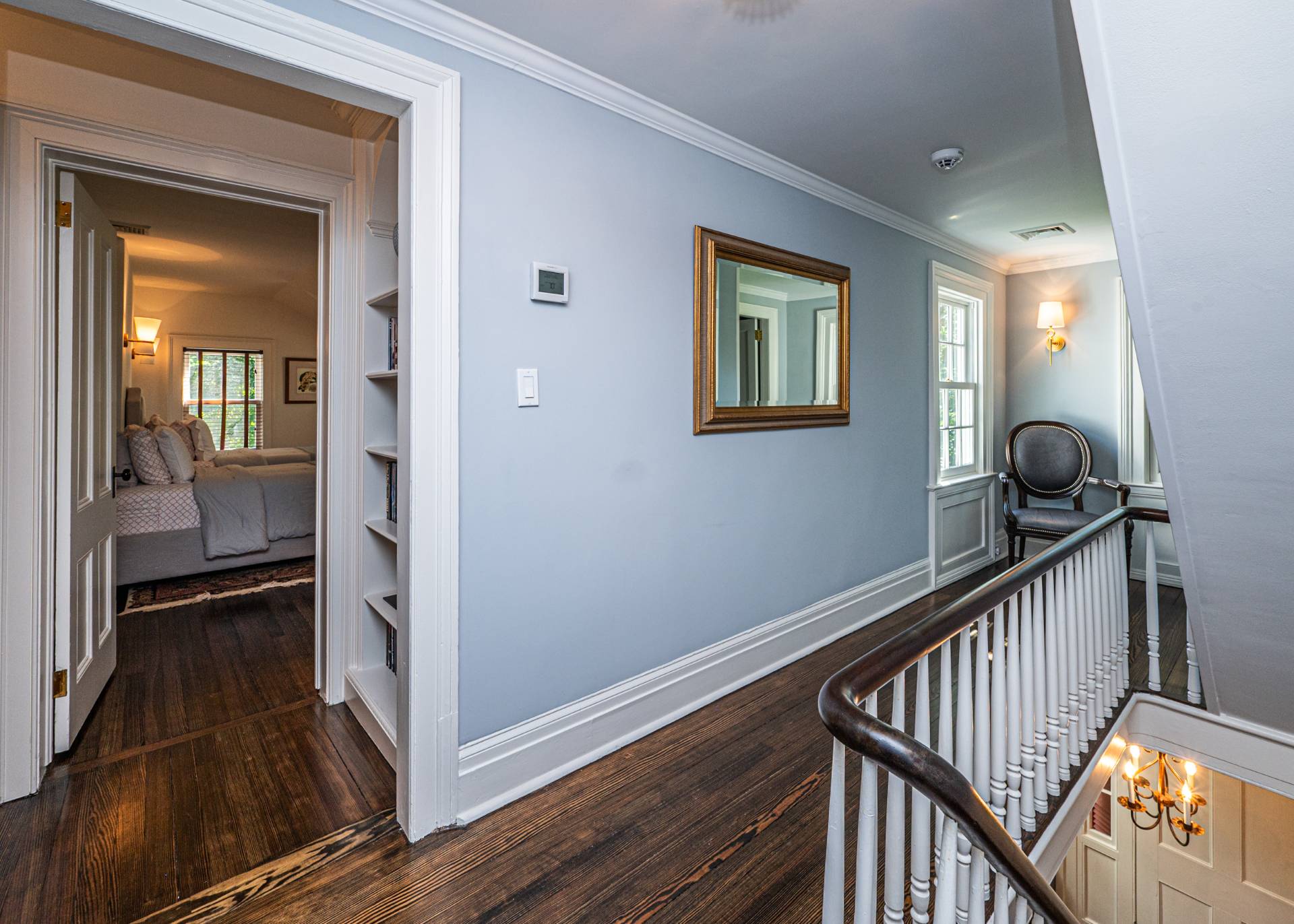 92 South Country Road Remsenburg-Speonk, NY 11960 - Photo 17 of 30 a view of a hallway and wooden floor and stairs