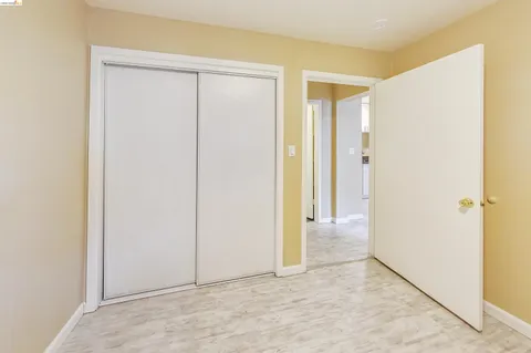 a view of a livingroom with wooden floor