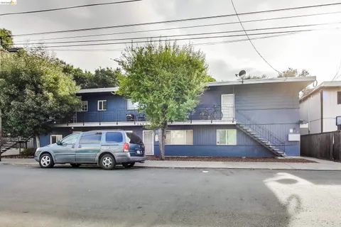 a car parked in front of a house
