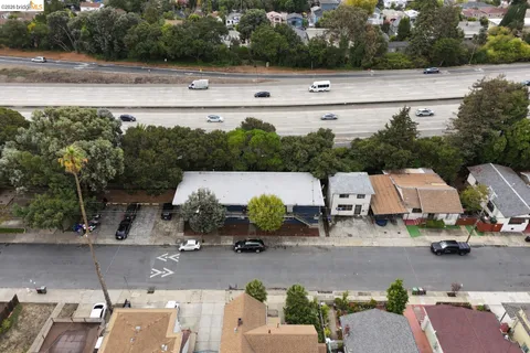 an aerial view of a yard with horses
