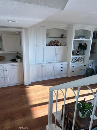 a kitchen with stainless steel appliances granite countertop a stove and a refrigerator