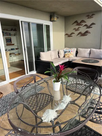 a view of a dining room with furniture wooden floor and window