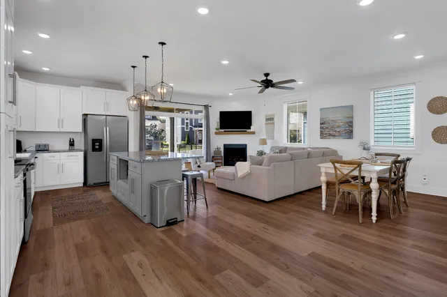 a spacious bedroom with a large bed and a flat screen tv