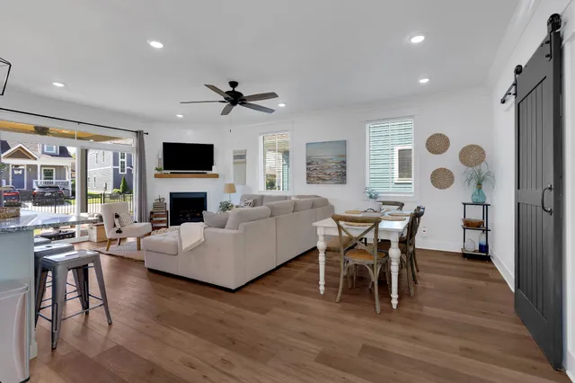 a spacious bedroom with a bed and a dresser