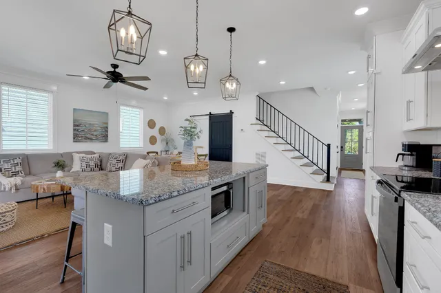 a living room with a bed and furniture