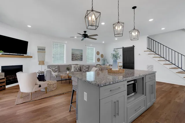 a bedroom with a bed and a flat tv screen