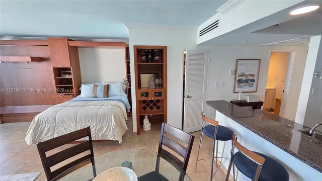 a view of living room and wooden floor