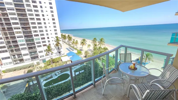 a view of a balcony with an ocean view