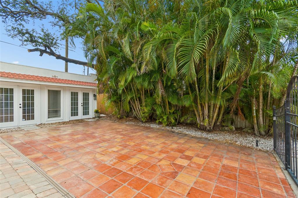 2434 West Prospect Road Tampa, FL 33629 - Photo 25 of 45 a view of a brick house with a yard