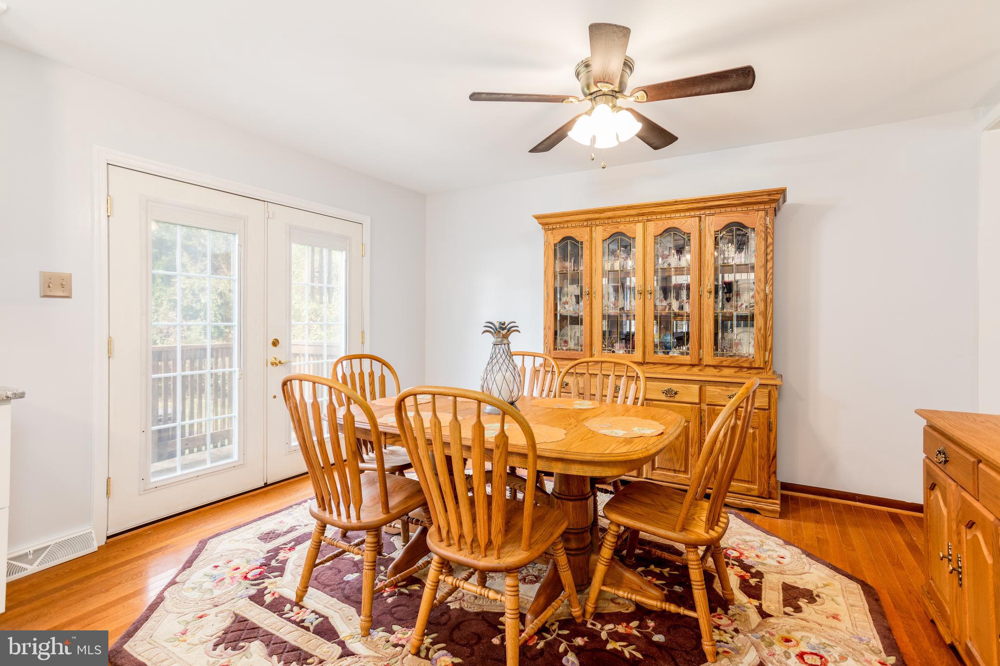 3365 Old Elk Neck Road Elkton, MD 21921 - Photo 9 of 21 Dining area in kitchen with doors to back patio