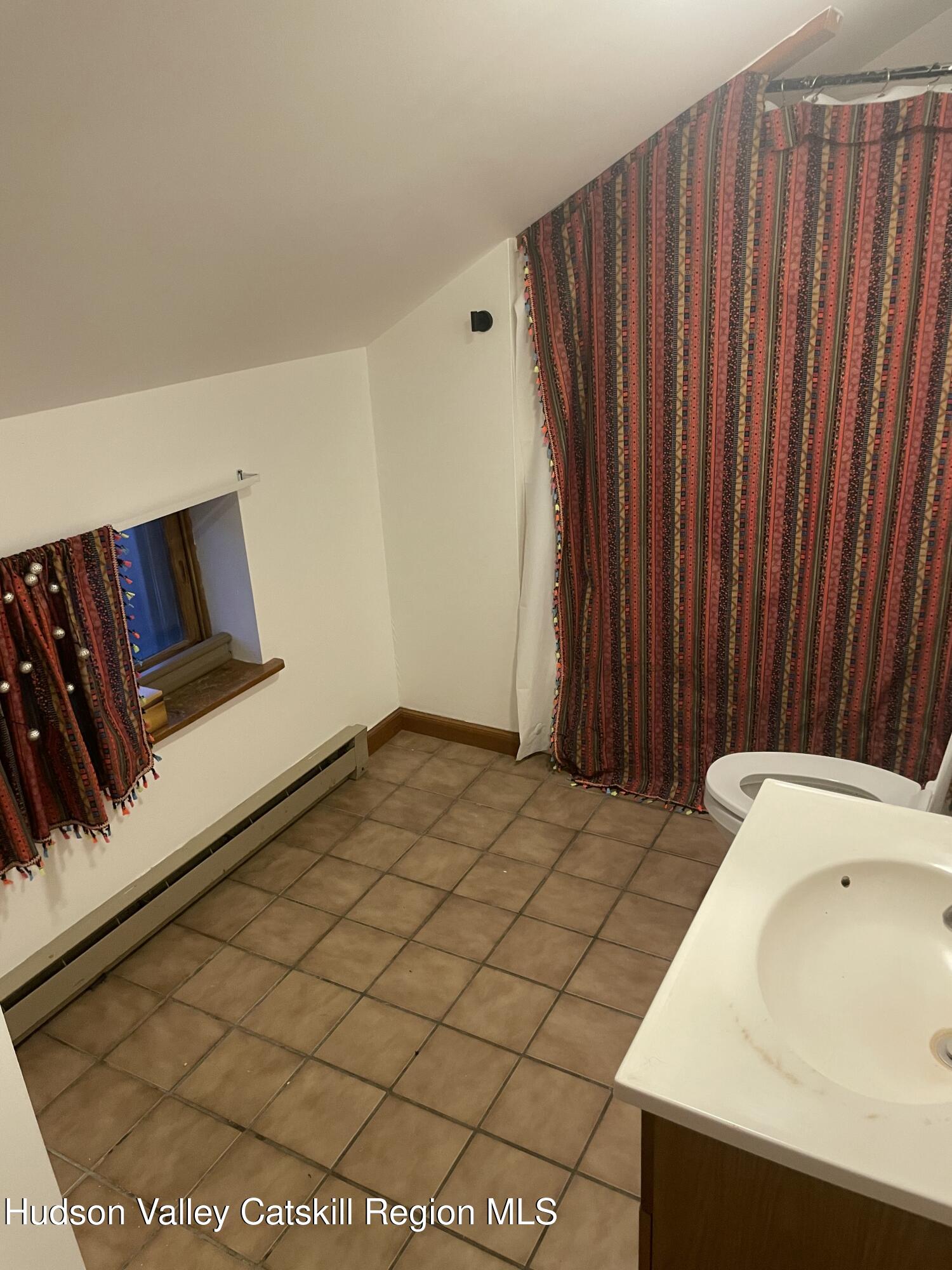 1218 Burlingham Road Pine Bush, NY 12566 - Photo 17 of 28 a bathroom with a sink and vanity