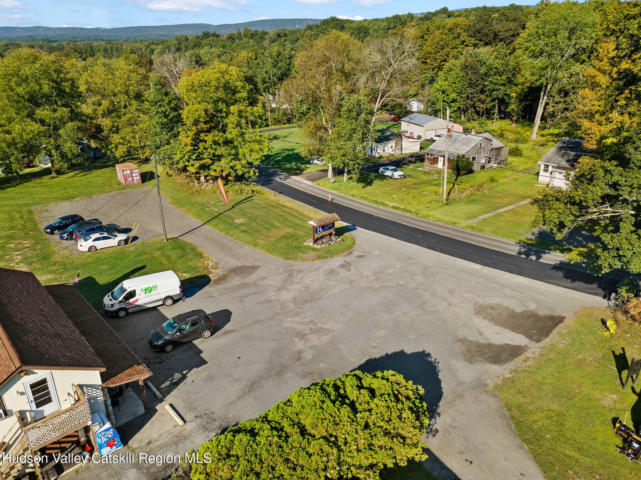 1218 Burlingham Road Pine Bush, NY 12566 - Photo 18 of 28 an aerial view of a swimming pool with a yard