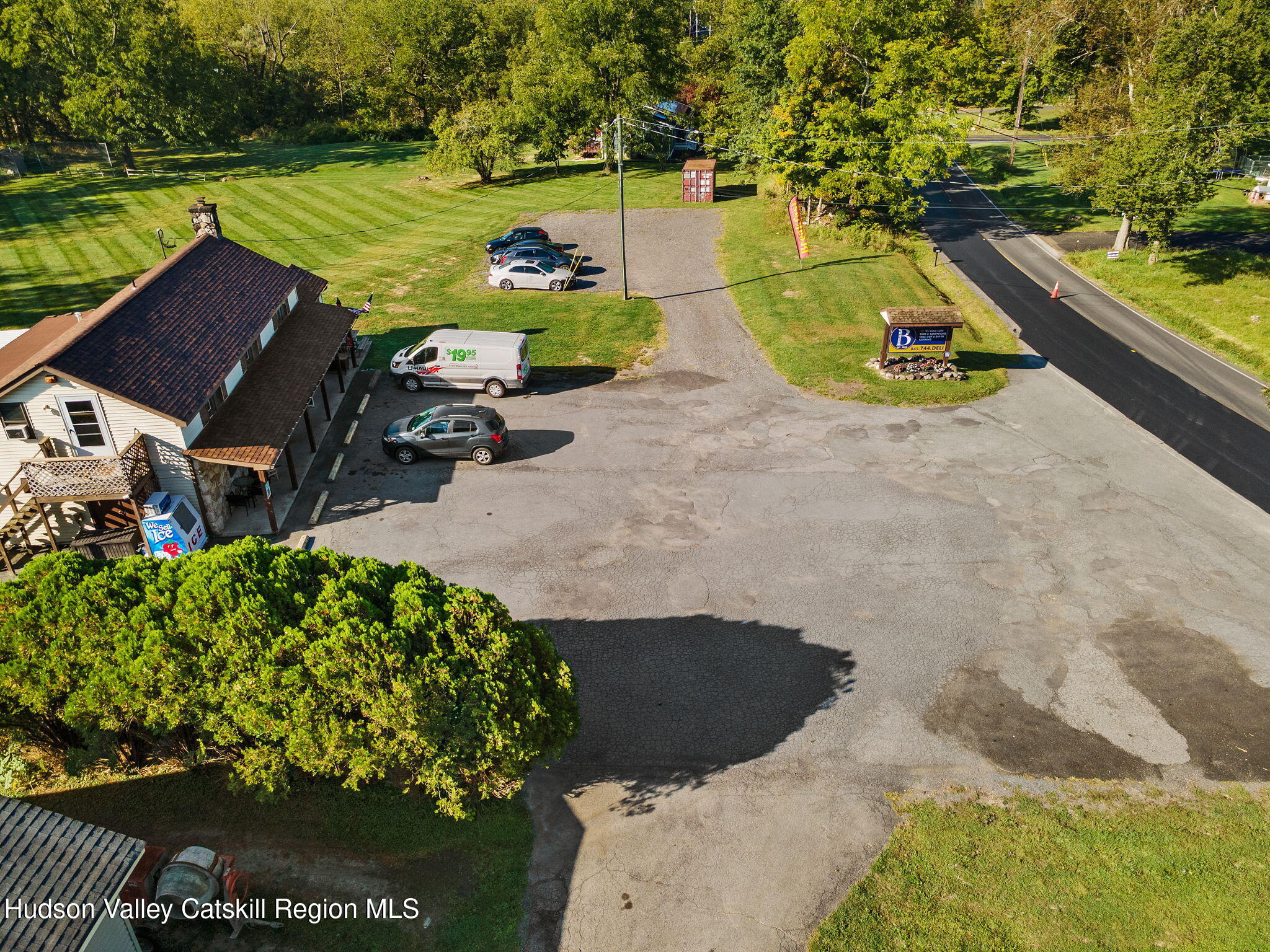 1218 Burlingham Road Pine Bush, NY 12566 - Photo 19 of 28 an aerial view of a house with a garden and lake view