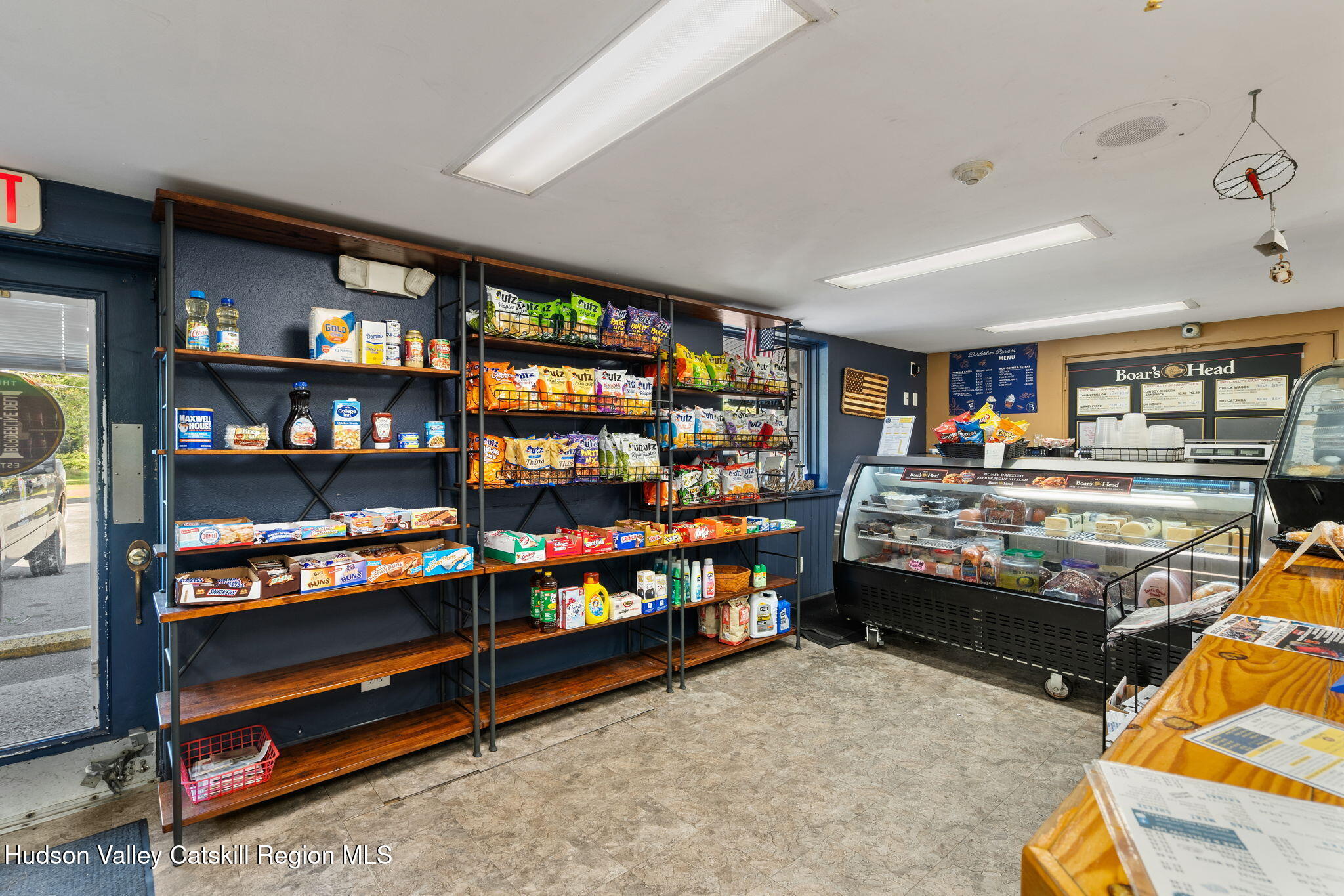 1218 Burlingham Road Pine Bush, NY 12566 - Photo 6 of 28 a bedroom with lots of furniture and a book shelf