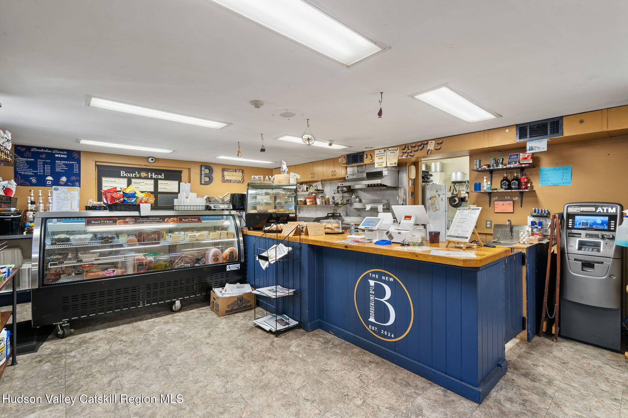 1218 Burlingham Road Pine Bush, NY 12566 - Photo 8 of 28 a kitchen with stainless steel appliances granite countertop a sink and a stove