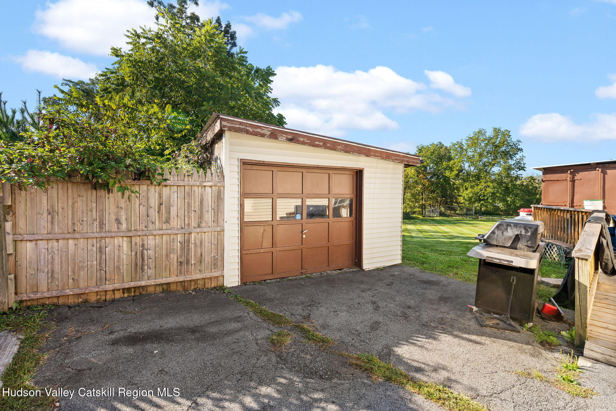 1218 Burlingham Road Pine Bush, NY 12566 - Photo 10 of 28 a view of a small house with wooden fence