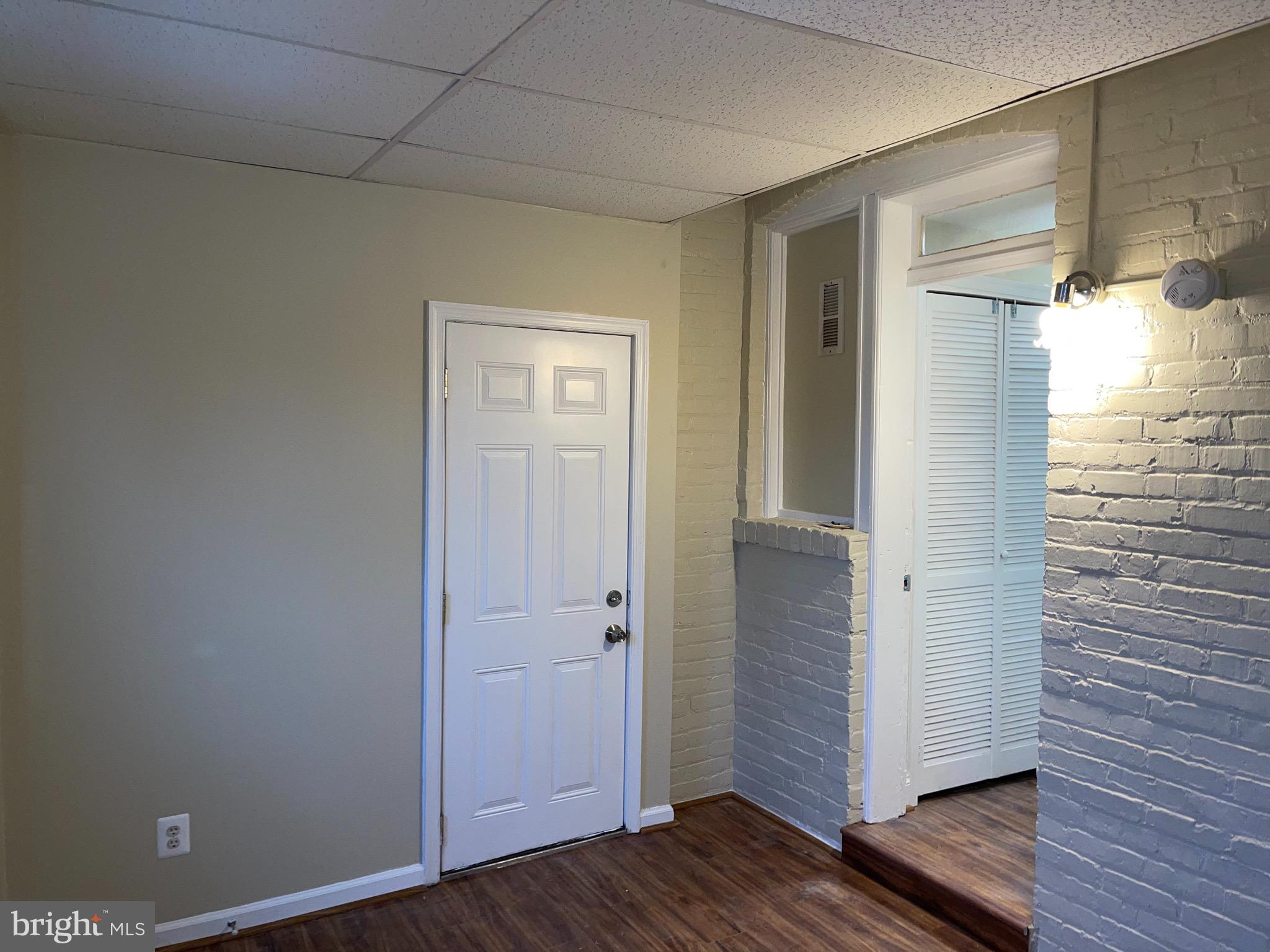 2210 Nicholson Street Southeast, Unit 3 Washington, DC 20020 - Photo 15 of 25 a view of empty room with wooden floor