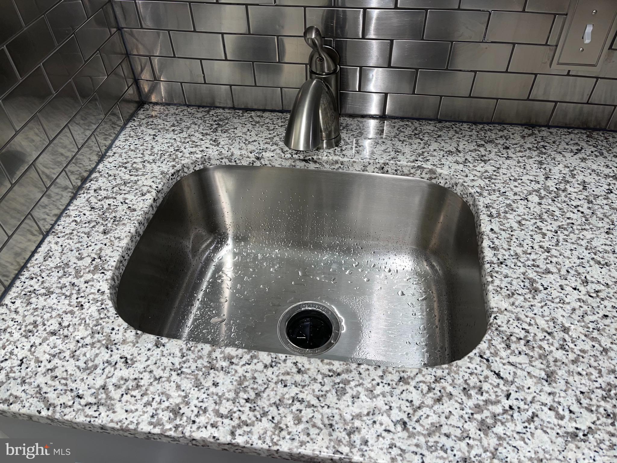 2210 Nicholson Street Southeast, Unit 3 Washington, DC 20020 - Photo 9 of 25 a close view of sink