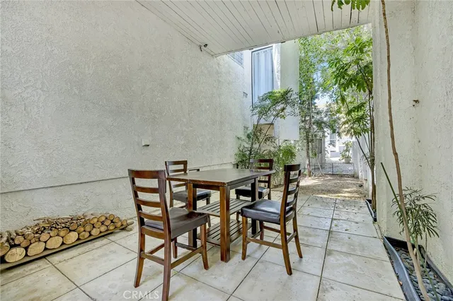 a view of washer and dryer with kitchen in the background