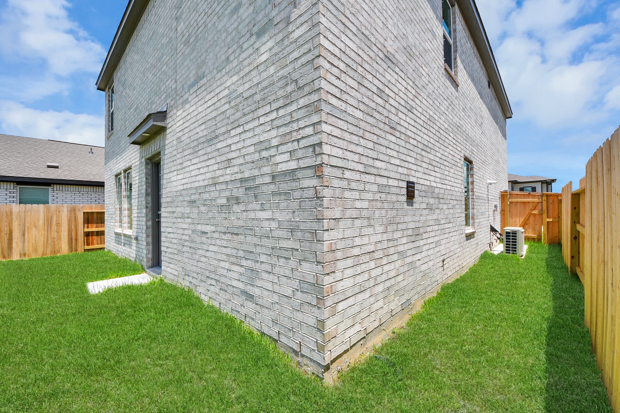 2931 Summer Breeze Way Angleton, TX 77515 - Photo 27 of 30 a view of a back yard of the house