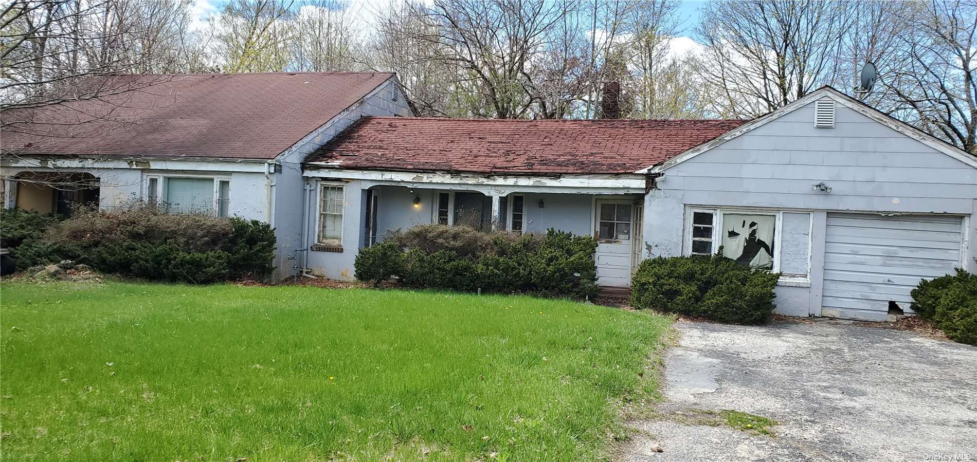 a house view with a garden space