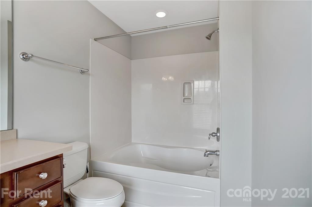 905 Lyndley Drive Fort Mill, SC 29708 - Photo 15 of 28 a bathroom with a shower a toilet and sink