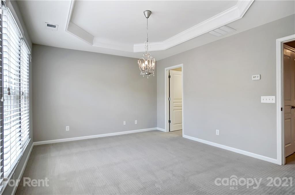 905 Lyndley Drive Fort Mill, SC 29708 - Photo 18 of 28 a view of an empty room with a window