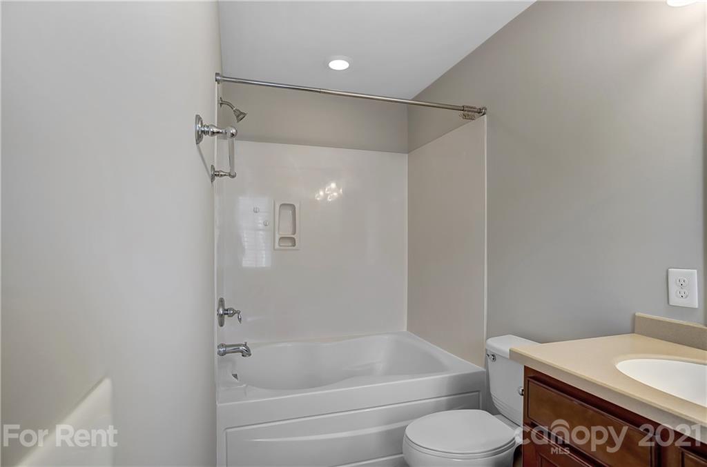 905 Lyndley Drive Fort Mill, SC 29708 - Photo 20 of 28 a bathroom with a bathtub toilet and sink