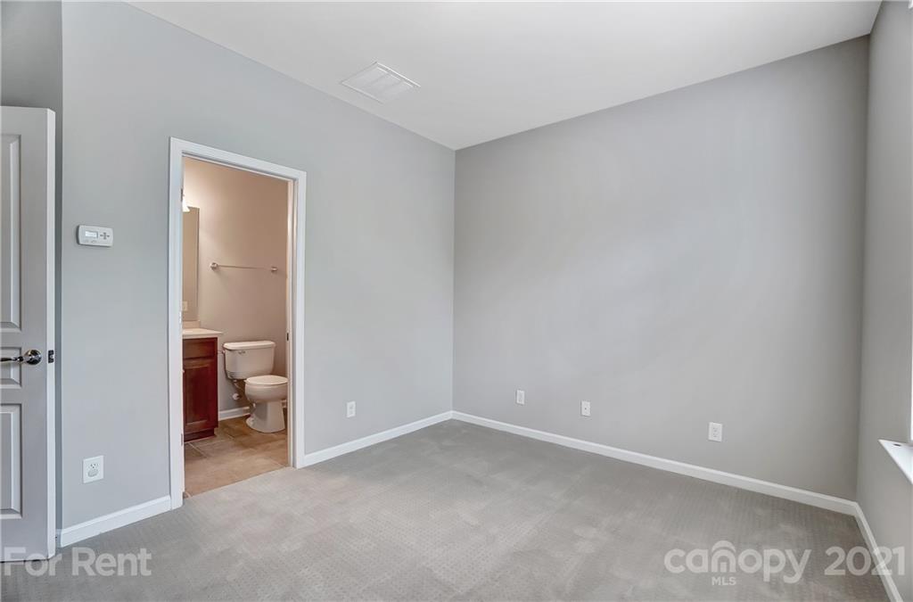 905 Lyndley Drive Fort Mill, SC 29708 - Photo 22 of 28 a view of an empty room and a gallery