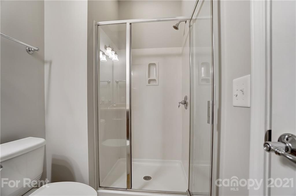 905 Lyndley Drive Fort Mill, SC 29708 - Photo 24 of 28 a bathroom with a shower and toilet