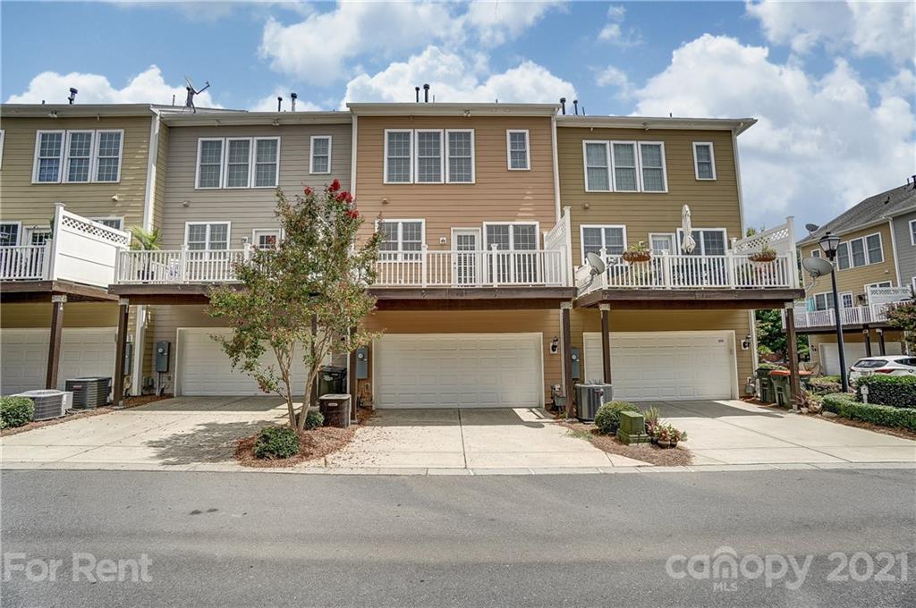 905 Lyndley Drive Fort Mill, SC 29708 - Photo 28 of 28 a front view of a house with a yard and garage