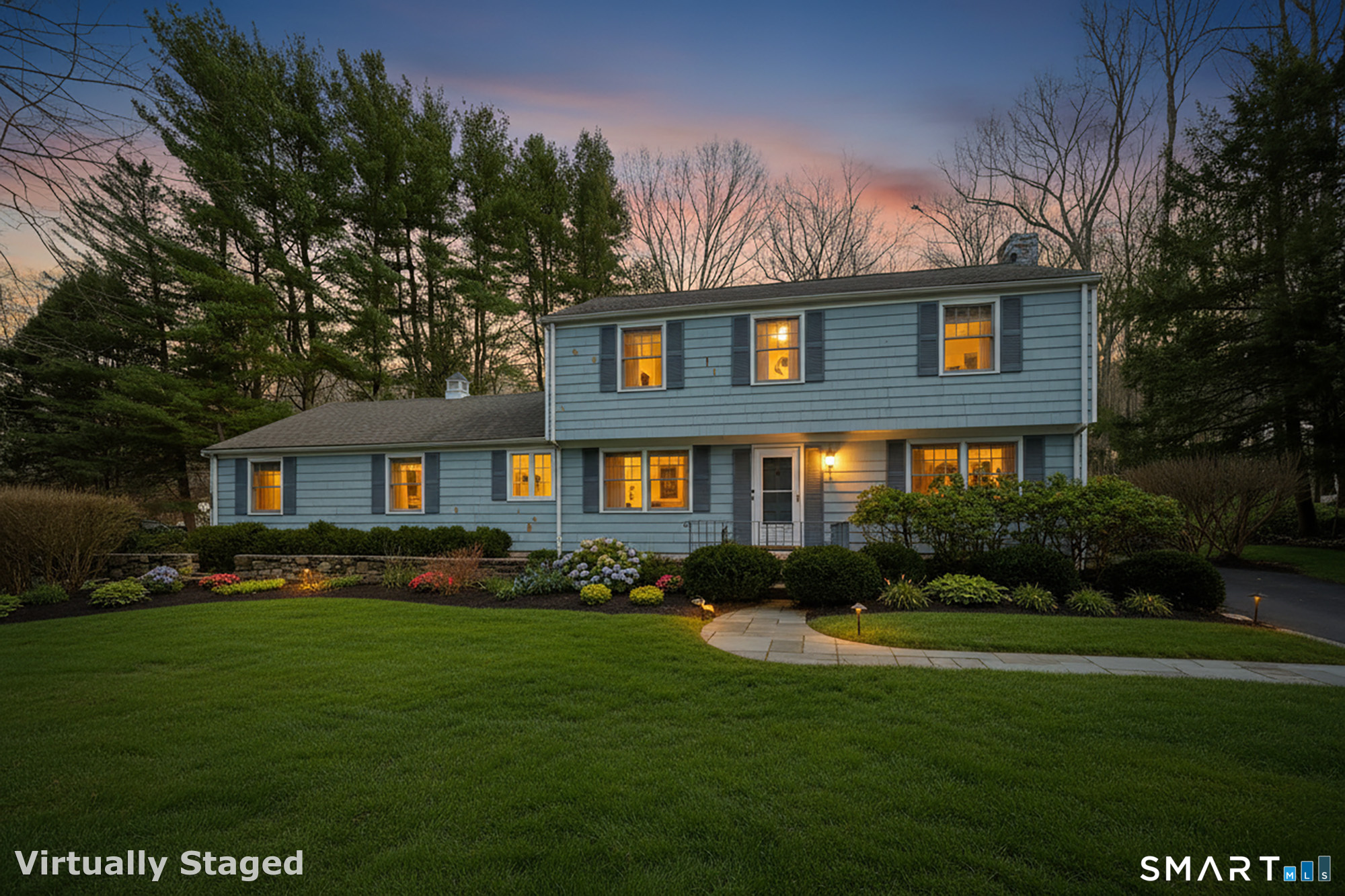 41 Old Mill Road Ridgefield, CT 06877 - Photo 1 of 33 a front view of a house with a garden