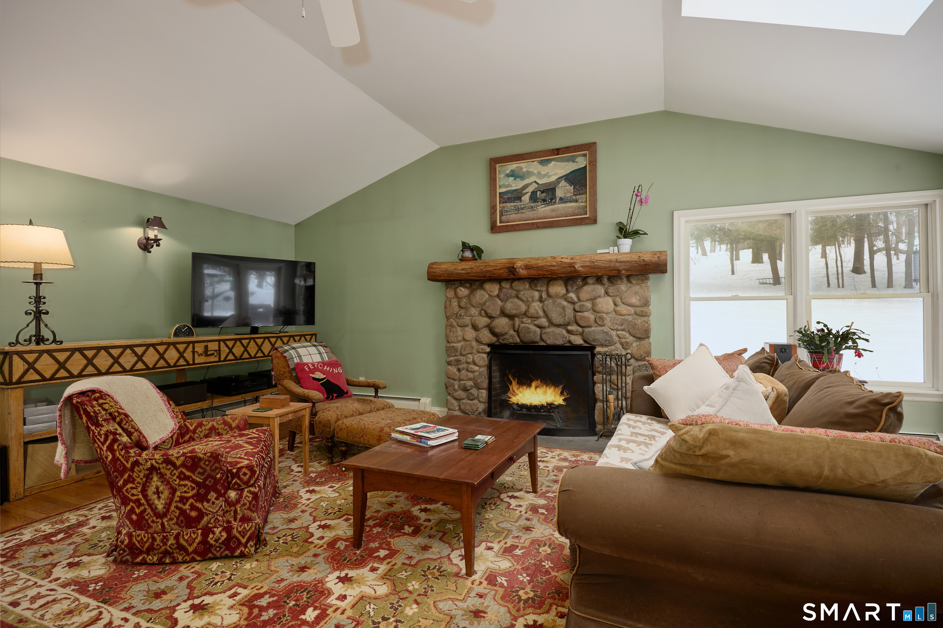 41 Old Mill Road Ridgefield, CT 06877 - Photo 15 of 33 a living room with furniture and a fireplace