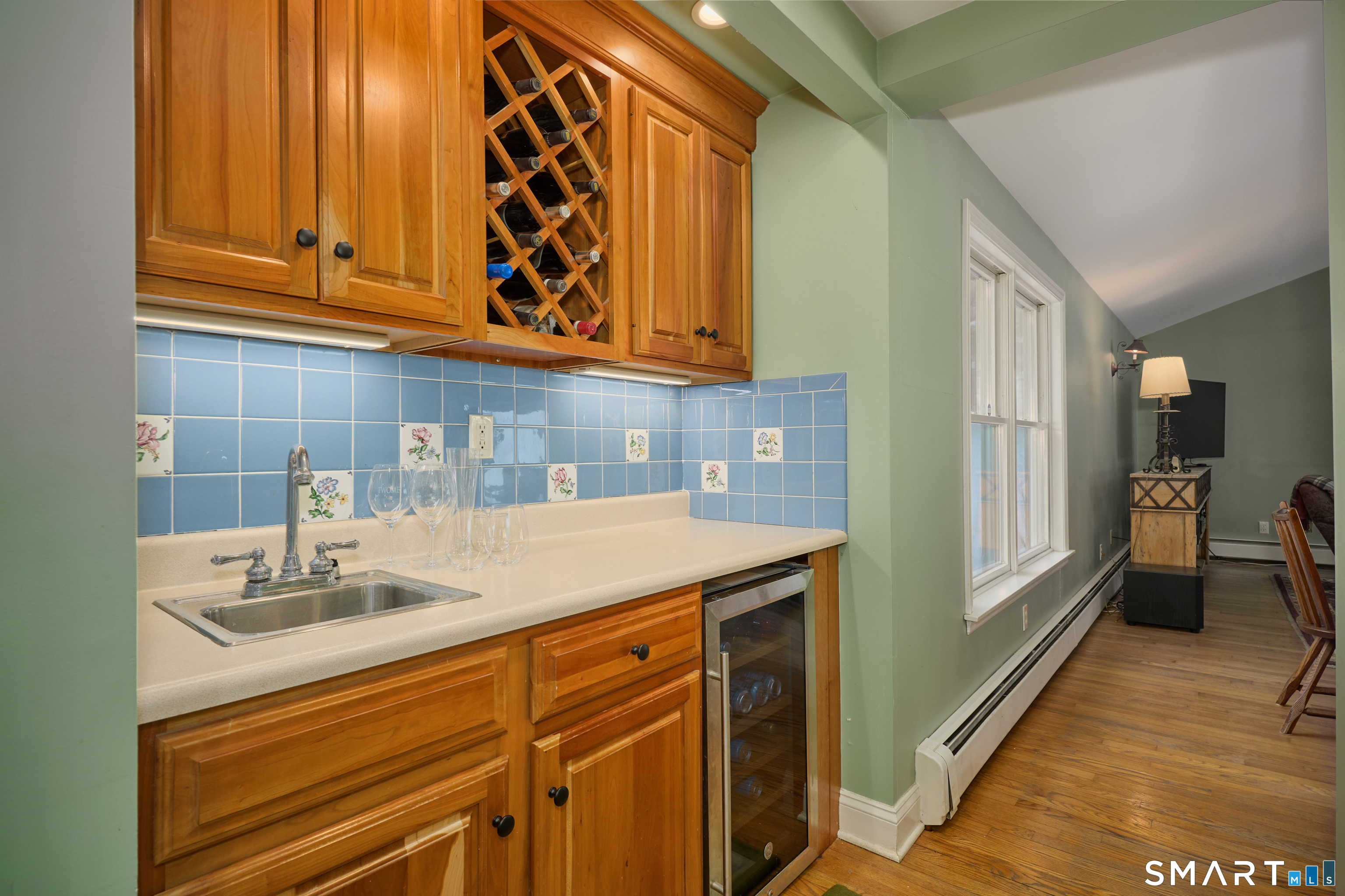 41 Old Mill Road Ridgefield, CT 06877 - Photo 18 of 33 a kitchen with stainless steel appliances granite countertop a sink and cabinets