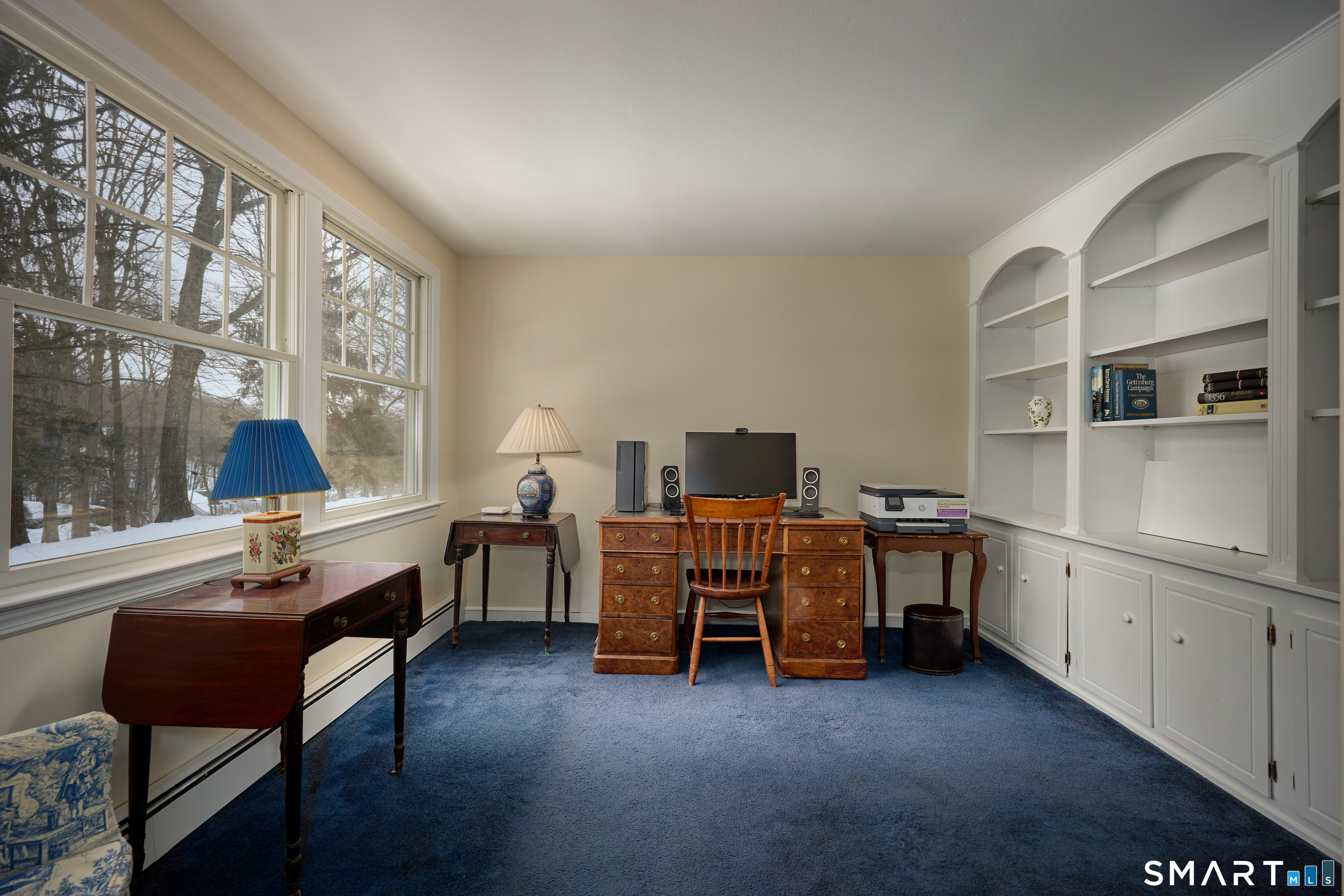 41 Old Mill Road Ridgefield, CT 06877 - Photo 19 of 33 a view of a workspace with furniture and a window
