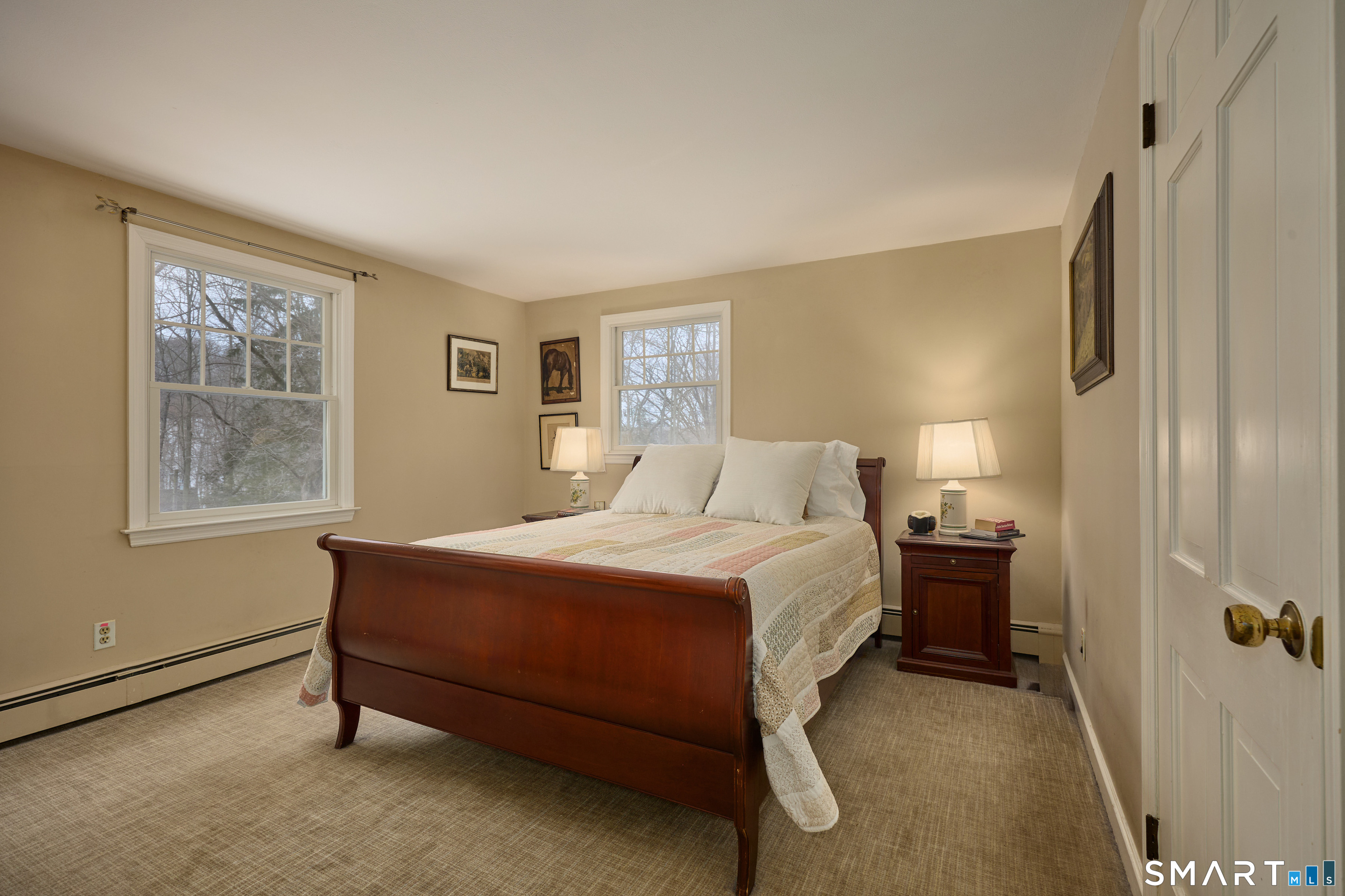 41 Old Mill Road Ridgefield, CT 06877 - Photo 20 of 33 a bedroom with a bed and a window