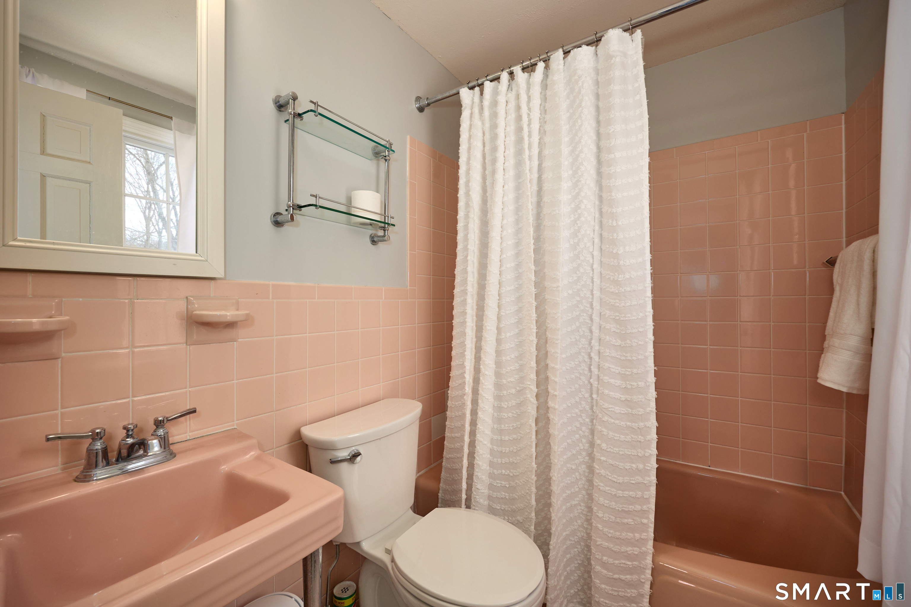 41 Old Mill Road Ridgefield, CT 06877 - Photo 21 of 33 a bathroom with a sink toilet and shower